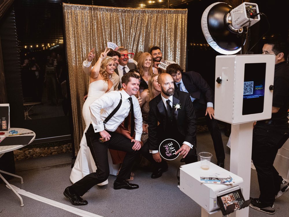 Guests posing at a photo booth