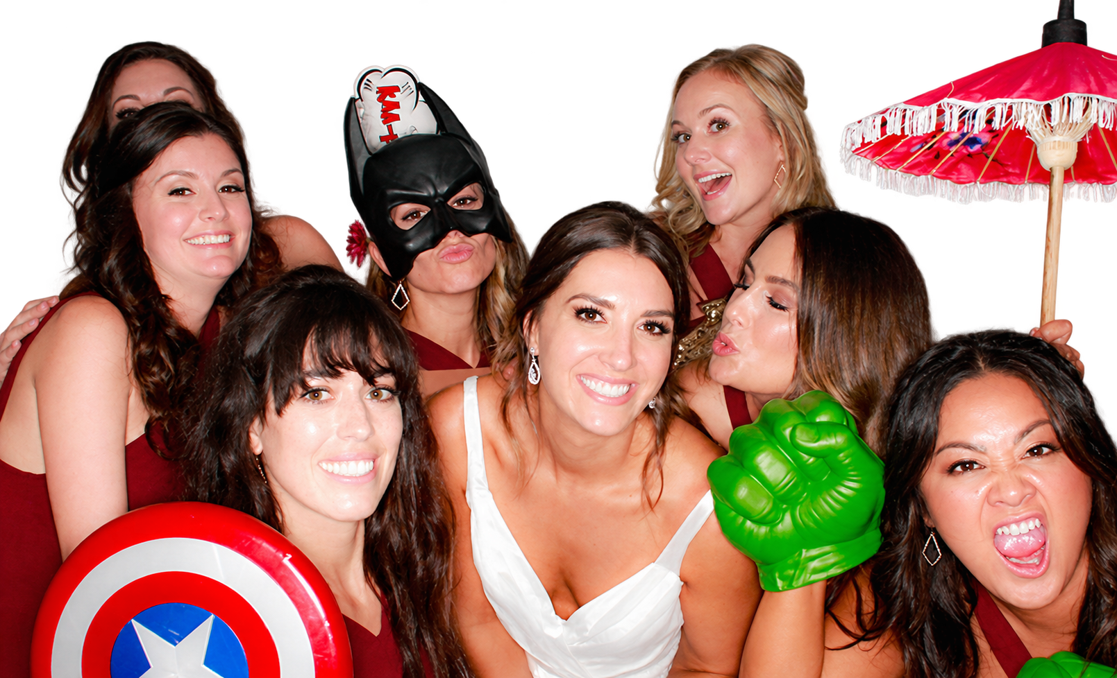 Wedding guests celebrating with playful props