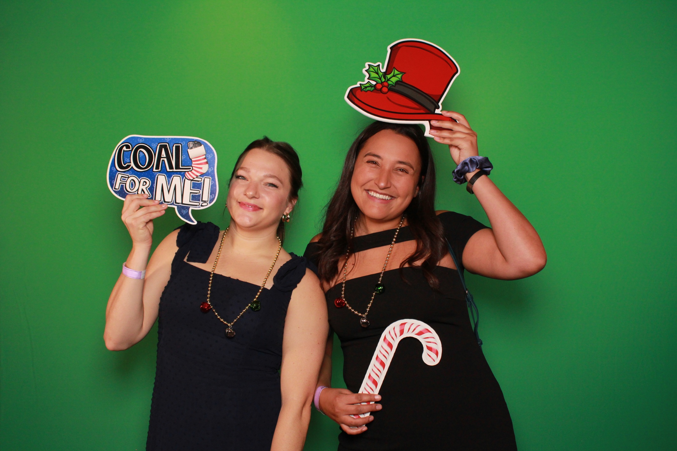 The same Technomics guests photographed against the original green screen
