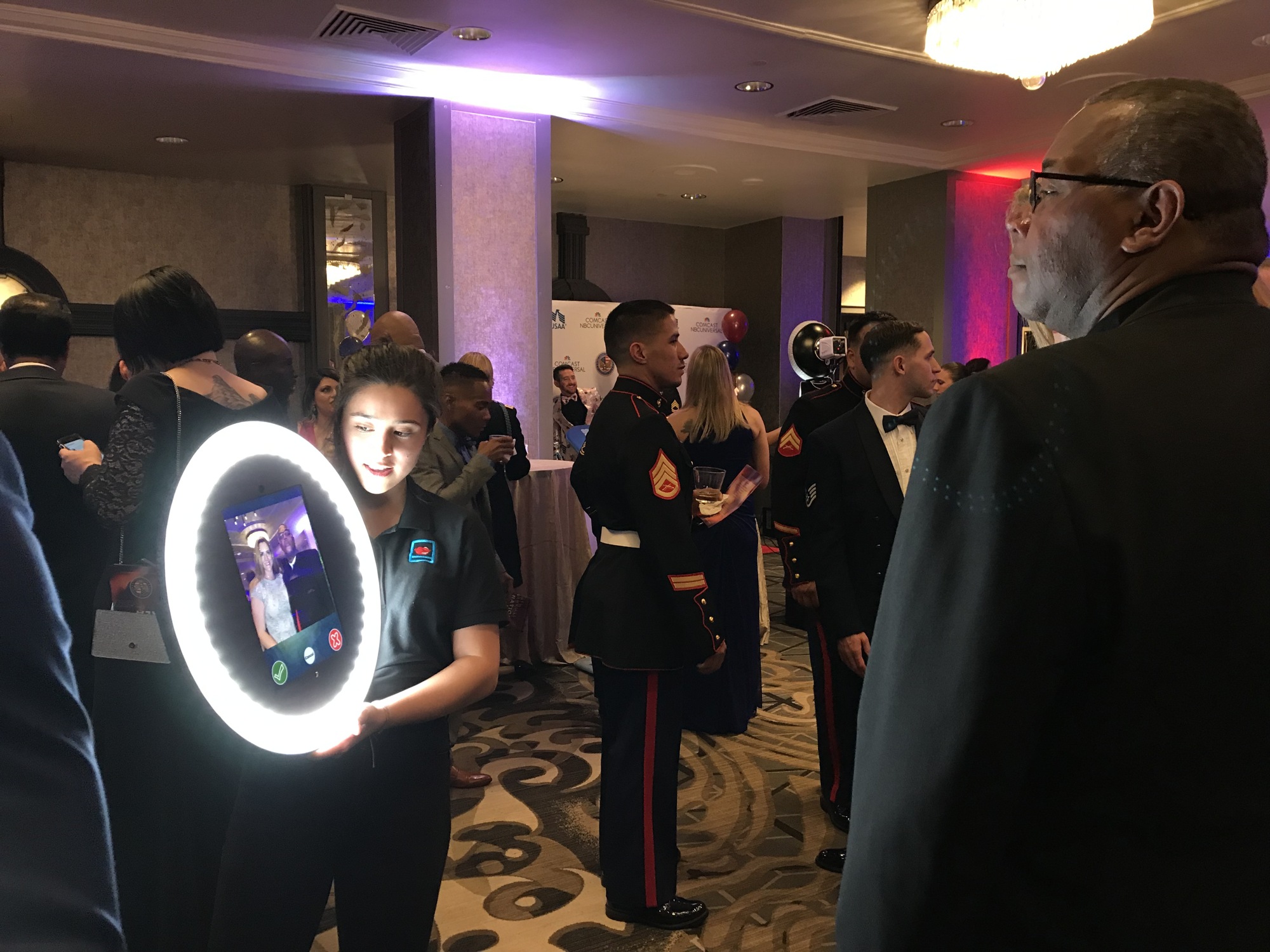 The roaming photo booth bringing guests together at an evening reception