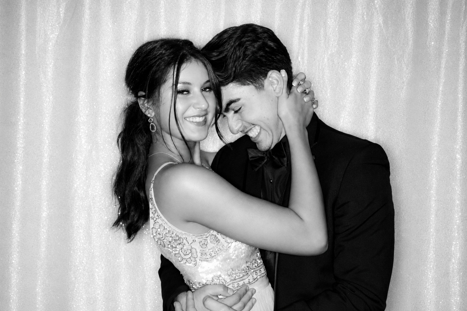 Supplied black-and-white portrait of a couple laughing together